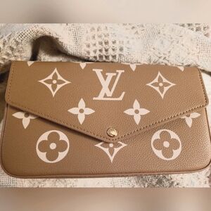 Authentic Louis Vuitton Tan Monogram Wristlet Clutch